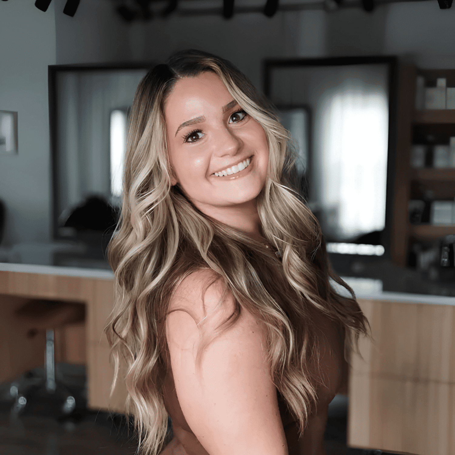 Portrait of Summer Thome, a professional stylist at The Mane Atelier, showcasing their expertise and style.